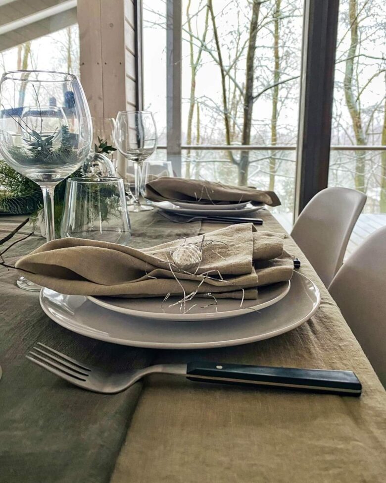 Table setting with glasses and plates at Bohemian Homes.
