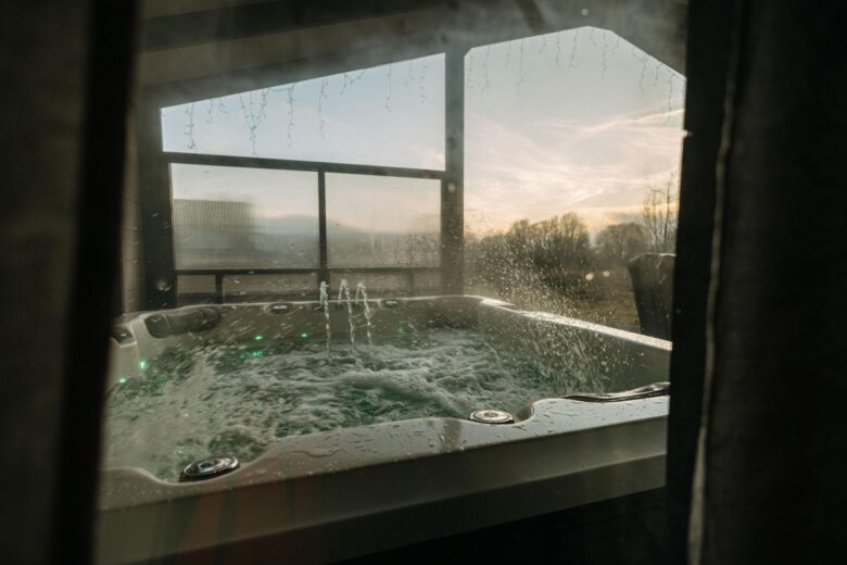Jacuzzi with water splashing at Bohemian Homes, Bohemian Switzerland, Czech Republic.